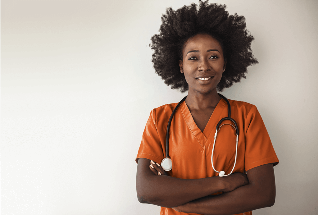 nuwest staff nurse in orange scrubs